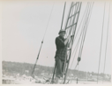 Image of Miriam MacMillan in rigging of schooner Bowdoin