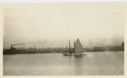 Image of schooner Bowdoin moored, one sail up