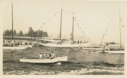 Image of Small boats about the dressed Bowdoin. (DBM in rigging?)