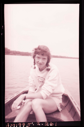 Image of Young woman in rowboat wearing Oberlin College shirt