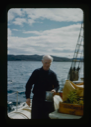 Image of Donald MacMillan on deck, hatless