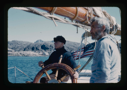 Image of A Greenlander, and Donald MacMillan at wheel