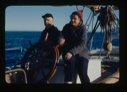 Image of Miriam and Donald MacMillan sitting at the wheel (2 copies)