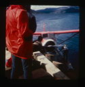 Image of Airplane landing at dock (2 copies)