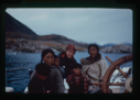 Image of Eskimo [Inuit] woman and children and Miriam MacMillan by wheel (2 copies)
