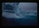 Image of Iceberg seen through hole of another iceberg