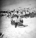 Image of Three People with Wood-laden Sledge