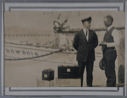 Image of Donald B. MacMillan and man (Mr. Ladd?) standing by Bowdoin