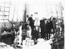Image of Crew and guests aboard the Bowdoin. Included: Thomas McCue. Jot Small, Ralph Rob