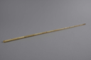 Image of whalebone rod, drilled at one end