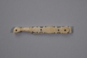 Image of small ivory folding knife with carved arm and fist motif 