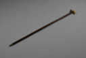 Image of walking stick with whale tooth handle, silver top and tooth end-cap, metal tip