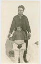Image of Richard Goddard and Inuit girl compare heights