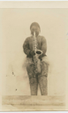 Image of Inuit woman playing a saxophone