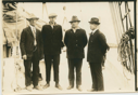 Image of Crew members on deck. L>R: Jot Small, ?, Thomas McCue, Donald MacMillan