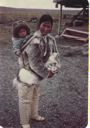 Image of Polar Inuit [Inughuit] mother with child in hood
