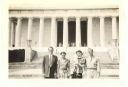 Image of Two couples and young boy on steps of a D.C. building