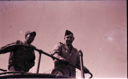 Image of Two men standing by upper rail of vessel