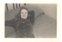 Image of Connie, lying on bed