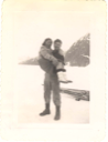 Image of Sgt. Parker holding Greenlandic woman
