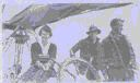 Image of Freida Hettasch and two crewmen at wheel