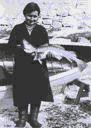 Image of Woman holding large fish