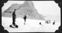 Image of Seven men on snow with equipment [Blurred]