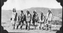 Image of Six Eskimo [Inuit] men in furs