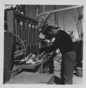 Image of Reginald Wilcox filleting cod