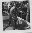 Image of Gary Valentine coiling up the mooring lines