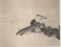 Image of Ak-pood-a-shah-o icing runners at Eskimo Point [Repairing a sledge]