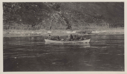 Image of Many Inuit in long open boat