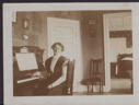 Image of Mrs. Rosen at the seminary piano