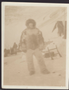 Image of Dr. Thorild Wulff, 2nd Thule expedition. Others beyond with supplies