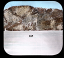 Image of Bird Cliff, north side Parker Snow Bay. Camera equipment on snow