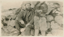 Image of Fitzhugh Green or Harrison Hunt sitting by Inuit (face out of photo frame) 