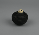 Image of small baleen basket with tiny lid, large-eyed seal finial