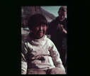 Image of Inuit boy aboard  [purple]