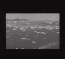 Image of The BOWDOIN moored among many ice floes  [b&w]