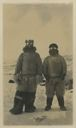 Image of Donald MacMillan and Etookashoo at Bay Fjord, wearing snow goggles