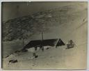 Image of Borup Lodge in winter, side view. Thermometer shelter