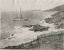 Image of The BOWDOIN moored near a rocky shore