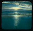 Image of Sunrise/set over water, cloud effects, rotting ice floes 