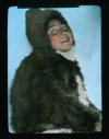 Image of Portrait: Ahl-ning-wa in furs. Head back, laughing