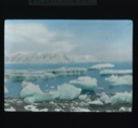 Image of Snow covered hills and iceberg remains