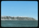 Image of Striated cliffs with snow