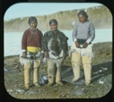 Image of Ahl-nah-loong-wa, Navrana and Inuaho standing near Hendrick's house