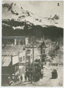 Image of A main street, snow-covered mountains beyond