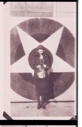 Image of Woman standing by star emblem