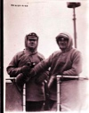Image of Two men aboard the S.S. PEARY. One wears heavy mittens.
